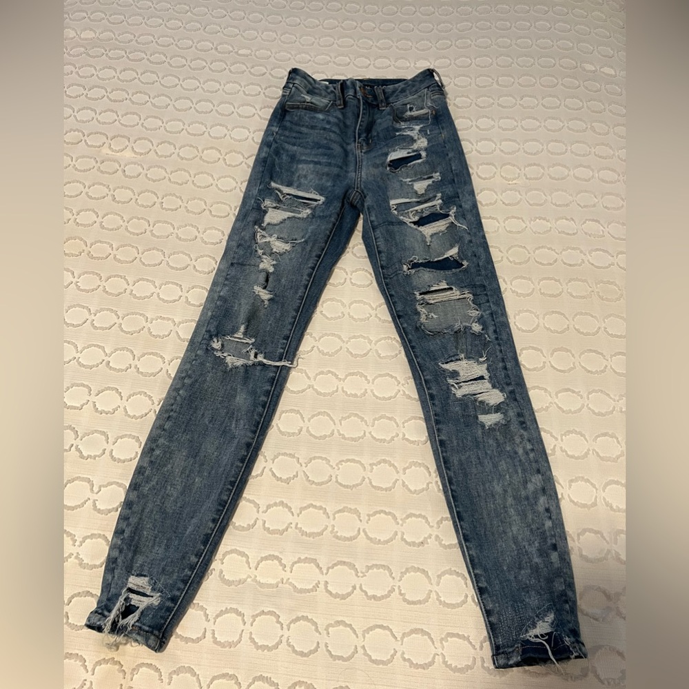 Blue ripped skinny jeans